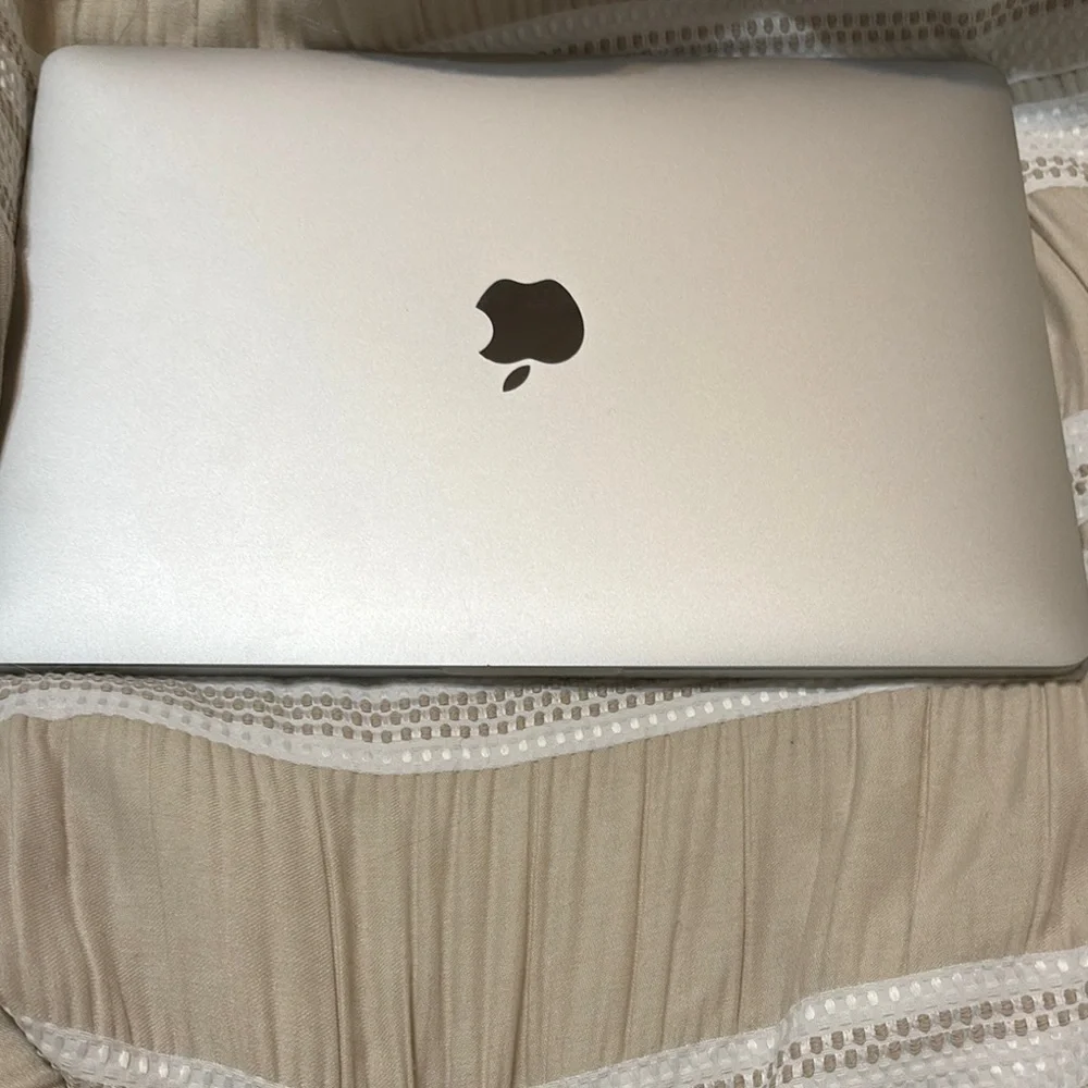 Apple Silver MacBook Pro with Backlit Keyboard and Touchpad